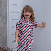 Jolly Stripe Christmas Kids Shirt featuring festive red, green, and white stripes in a classic t-shirt style. | Tropicool Clothing