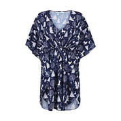 Navy kaftan with white festive reindeer and tree prints, drawstring waist, tropical holiday style. | Tropicool Clothing