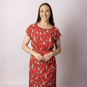 Close-up of the Celyn Reindeer Red Adult Dress showing reindeer and Christmas tree print — breathable summer fabric, stylish festive outfit ideal for parties and family photos.
