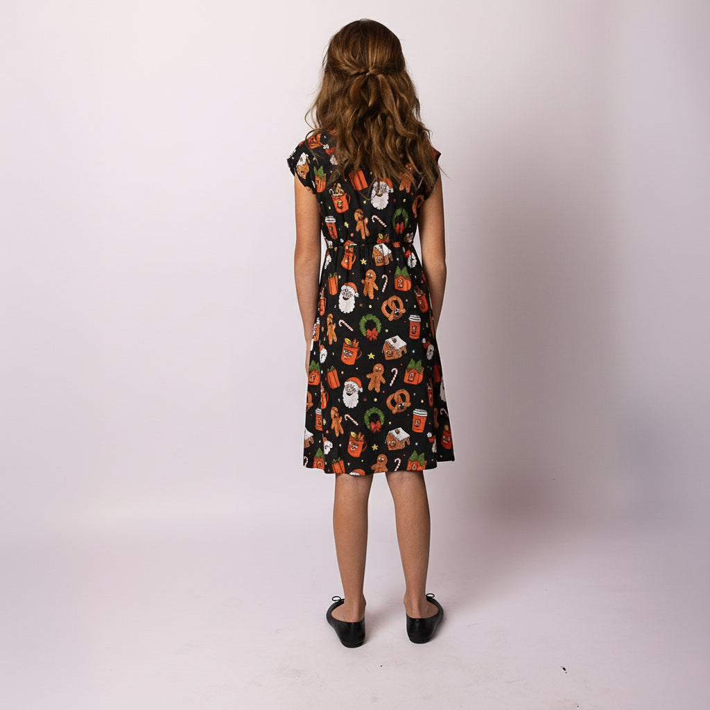 Back view of the Holly Jingleverse Christmas Kids Dress, showing the colourful festive rick and morty  print and comfortable fit