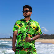 Sunset green adult Hawaiian shirt featuring tropical prints, festive style perfect for beachwear. | Tropicool Clothing