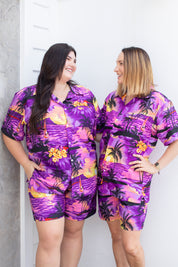 Sunset purple Hawaiian shirt and shorts set with tropical floral pattern; festive beachwear style. | Tropicool Clothing