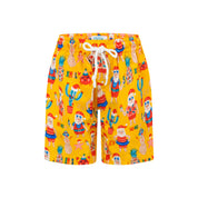 Kids Christmas shorts featuring red, green, and yellow Santas, cacti, pineapples, and beach motifs. | Tropicool Clothing